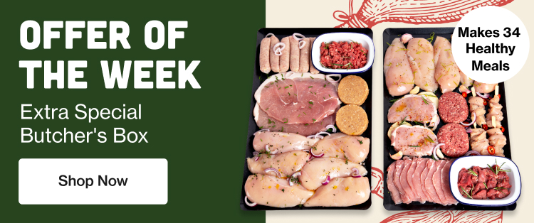 A large variety of raw meat arranged on 2 baking trays