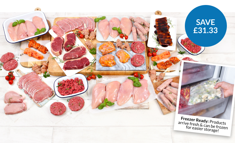 A huge selection of raw meats arranged on boards and plates