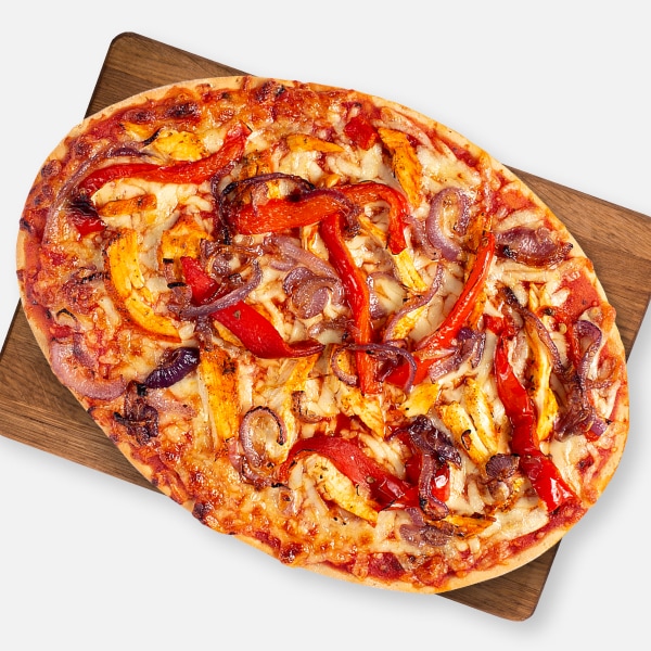 Buffalo Chicken pizza on a wooden board